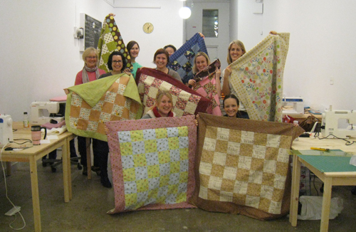 Class of completed quilts