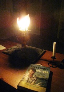 Reading 'Adventures in Solitude' by kerosene lamplight on Savary Island